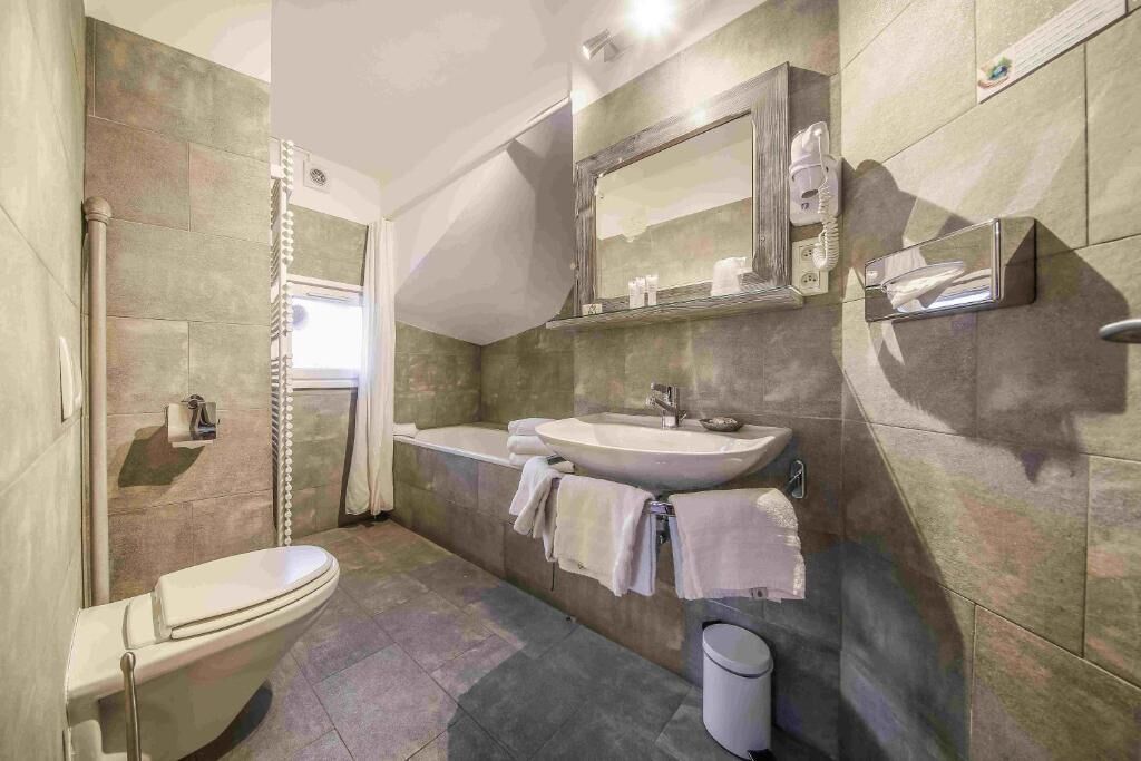 family quadruple room, non smoking, mountain view | bathroom | free toiletries, hair dryer, slippers, towels