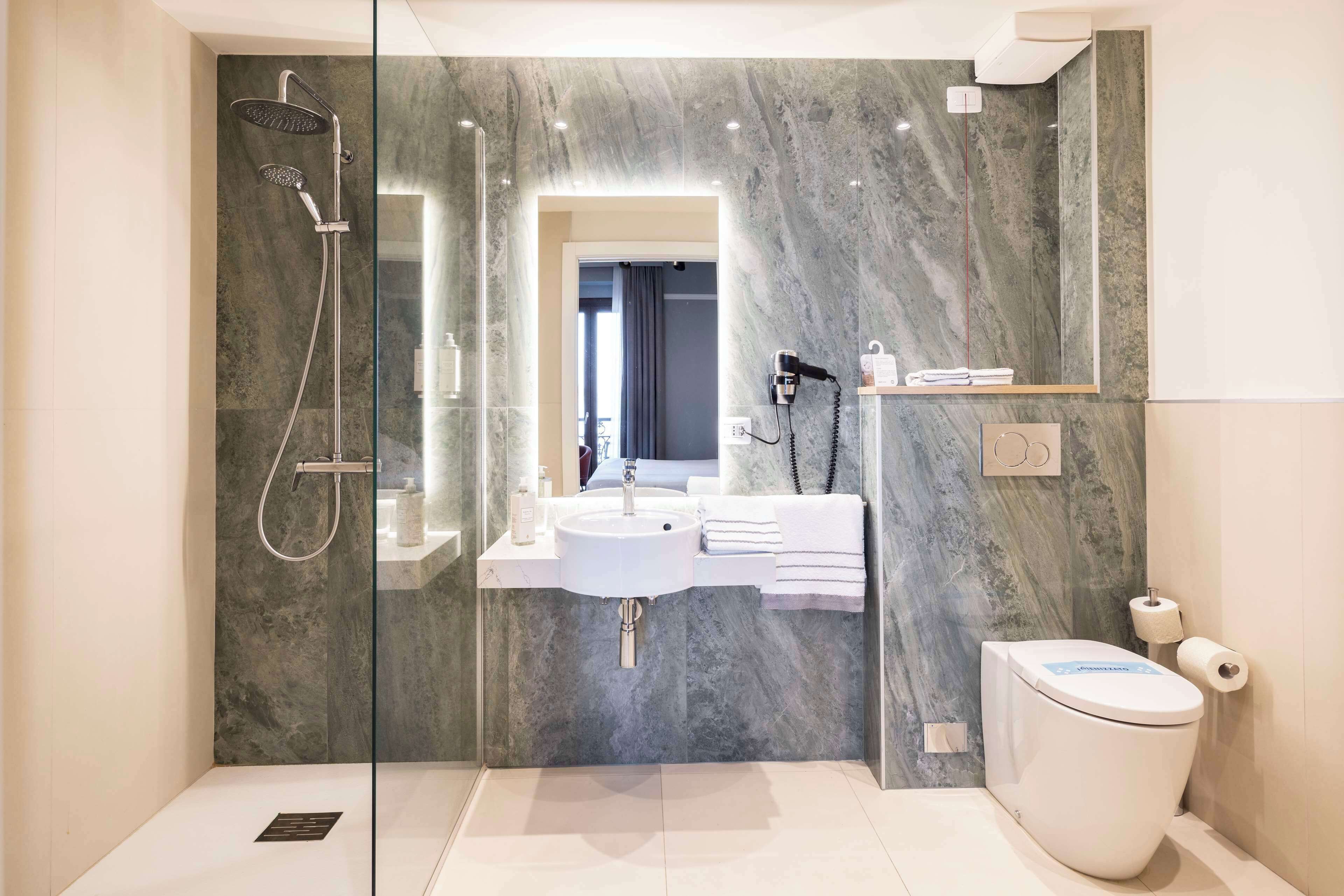 Shower, free toiletries, hair dryer, bathrobes