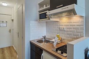 Fridge, microwave, stovetop, espresso maker