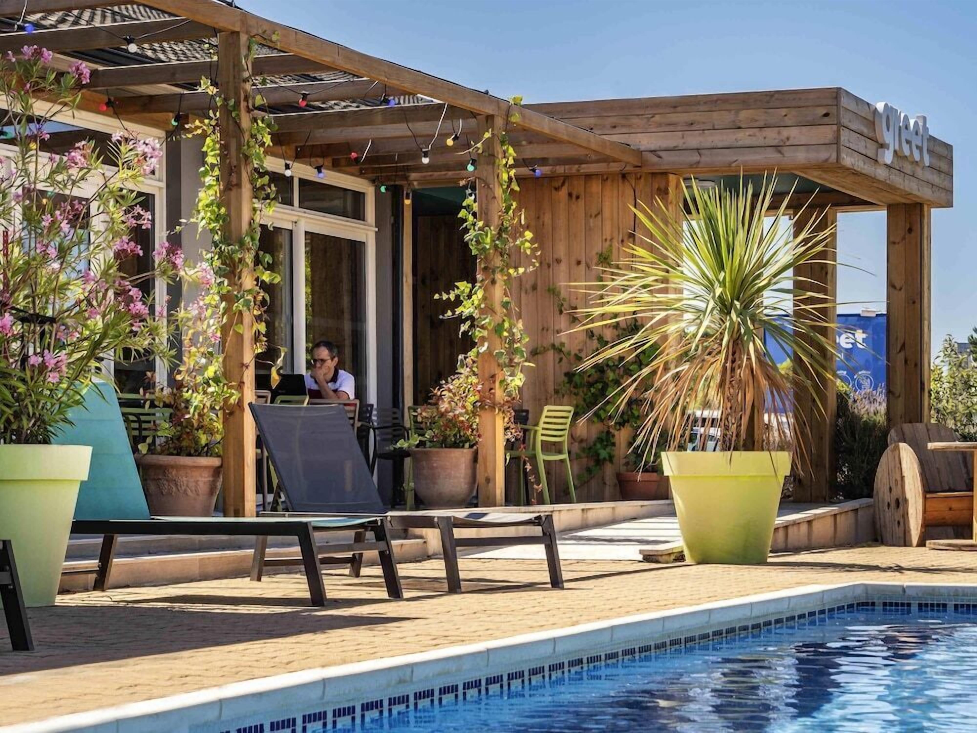 Outdoor pool, pool umbrellas, pool loungers
