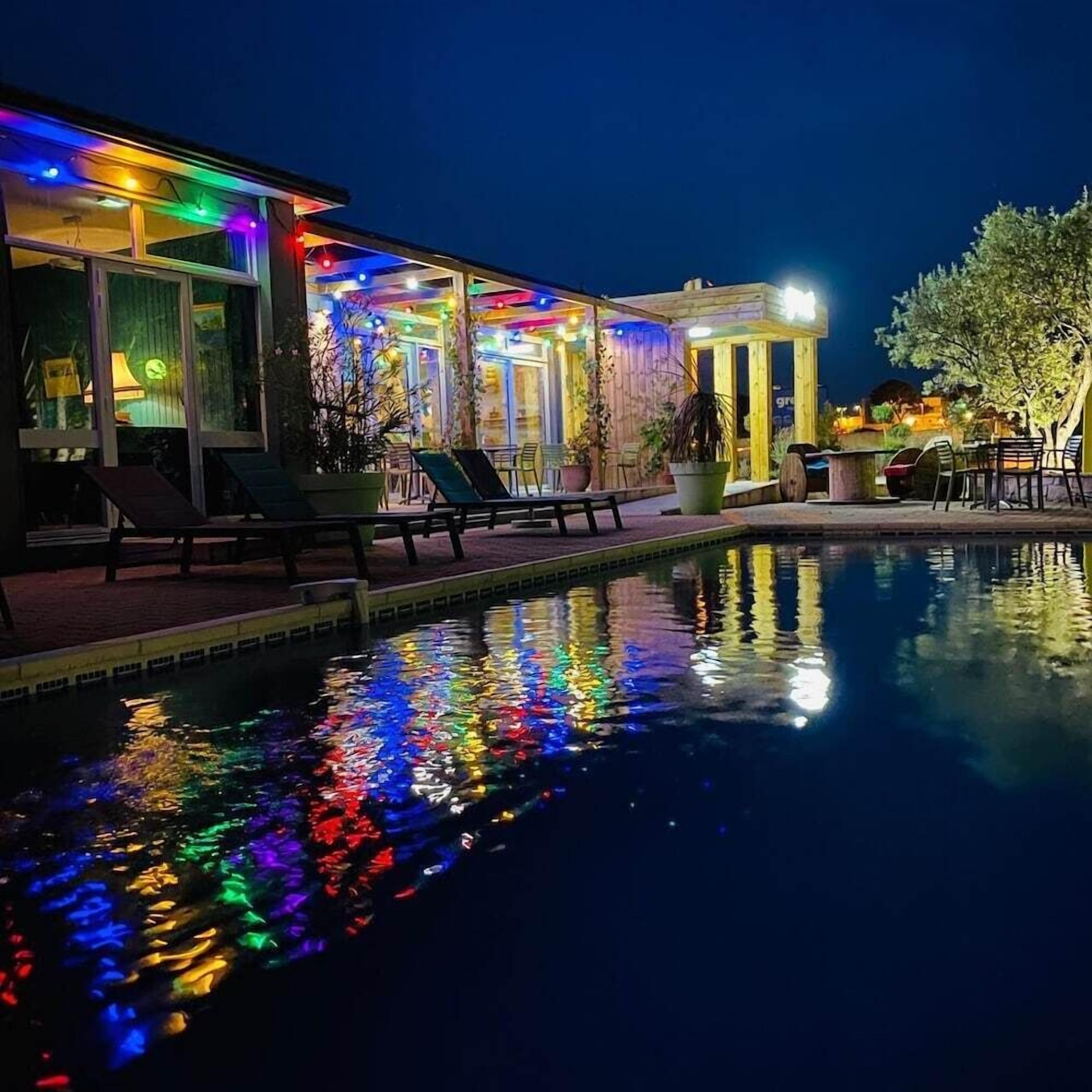 Outdoor pool, pool umbrellas, sun loungers