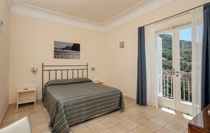 Habitació doble | Minibar, caixa forta a l'habitació, wifi gratuïta i roba de llit 