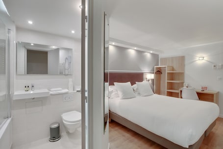 Select Comfort beds, desk, soundproofing, iron/ironing board. L'Amandier