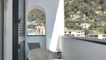 Junior Suite, Hot Tub, Sea View | Premium bedding, minibar, in-room safe, desk