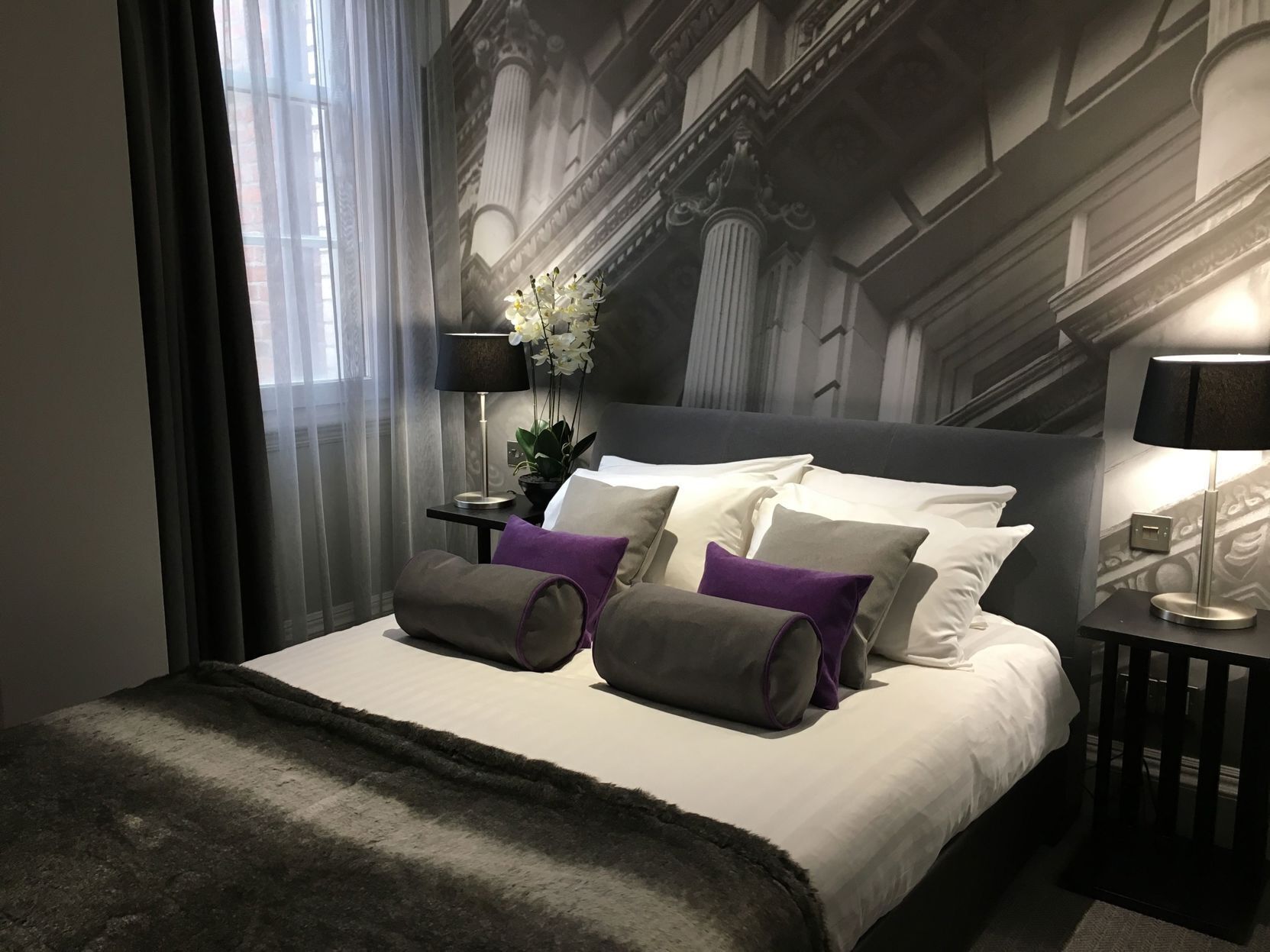 Premium bedding, in-room safe, individually decorated, desk