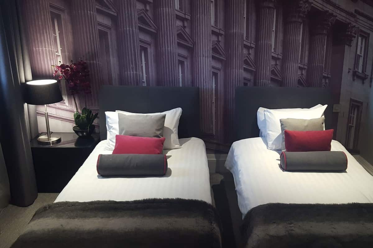 Premium bedding, in-room safe, individually decorated, desk