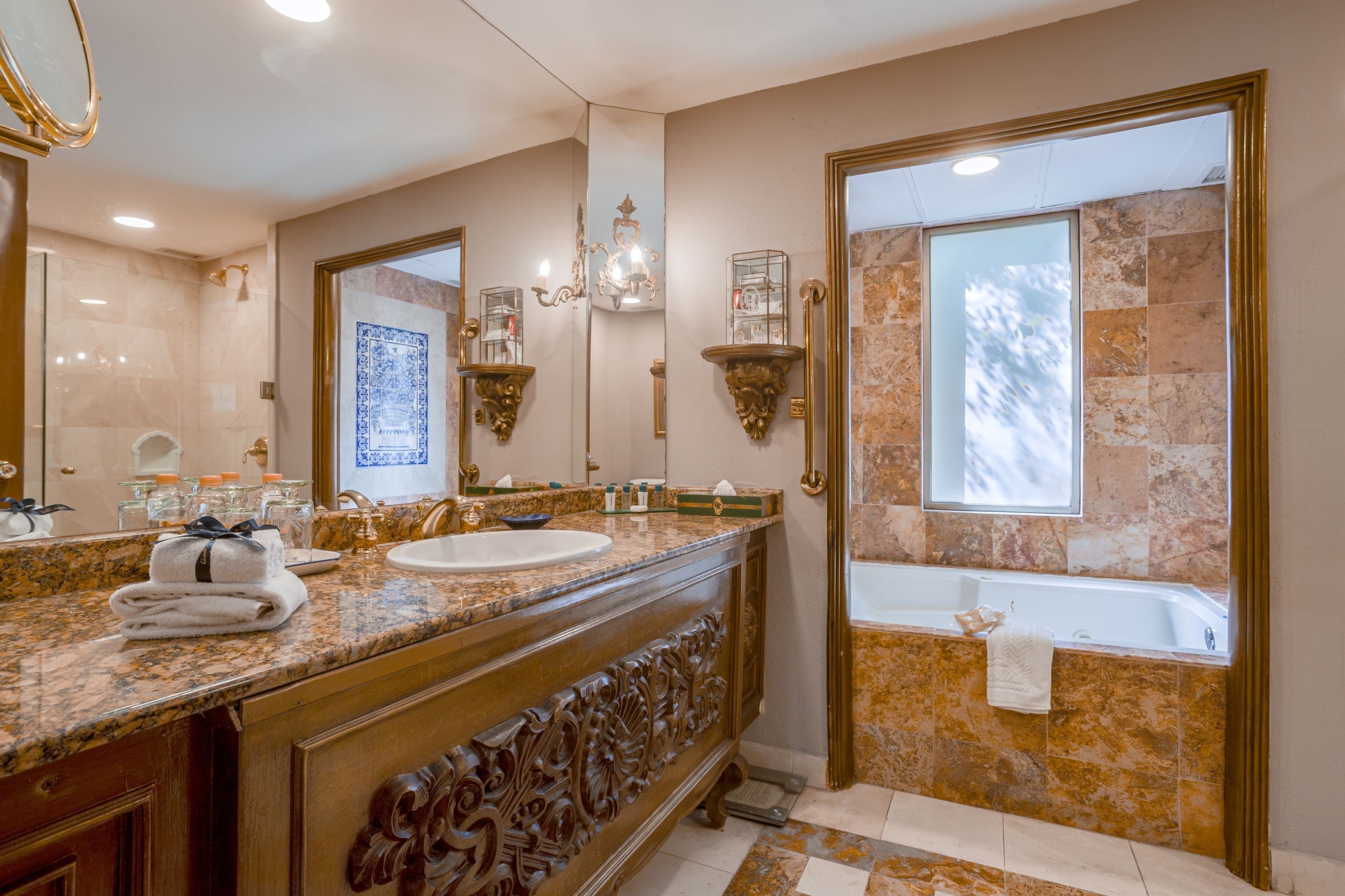 junior suite | bathroom | designer toiletries, hair dryer, bathrobes, slippers