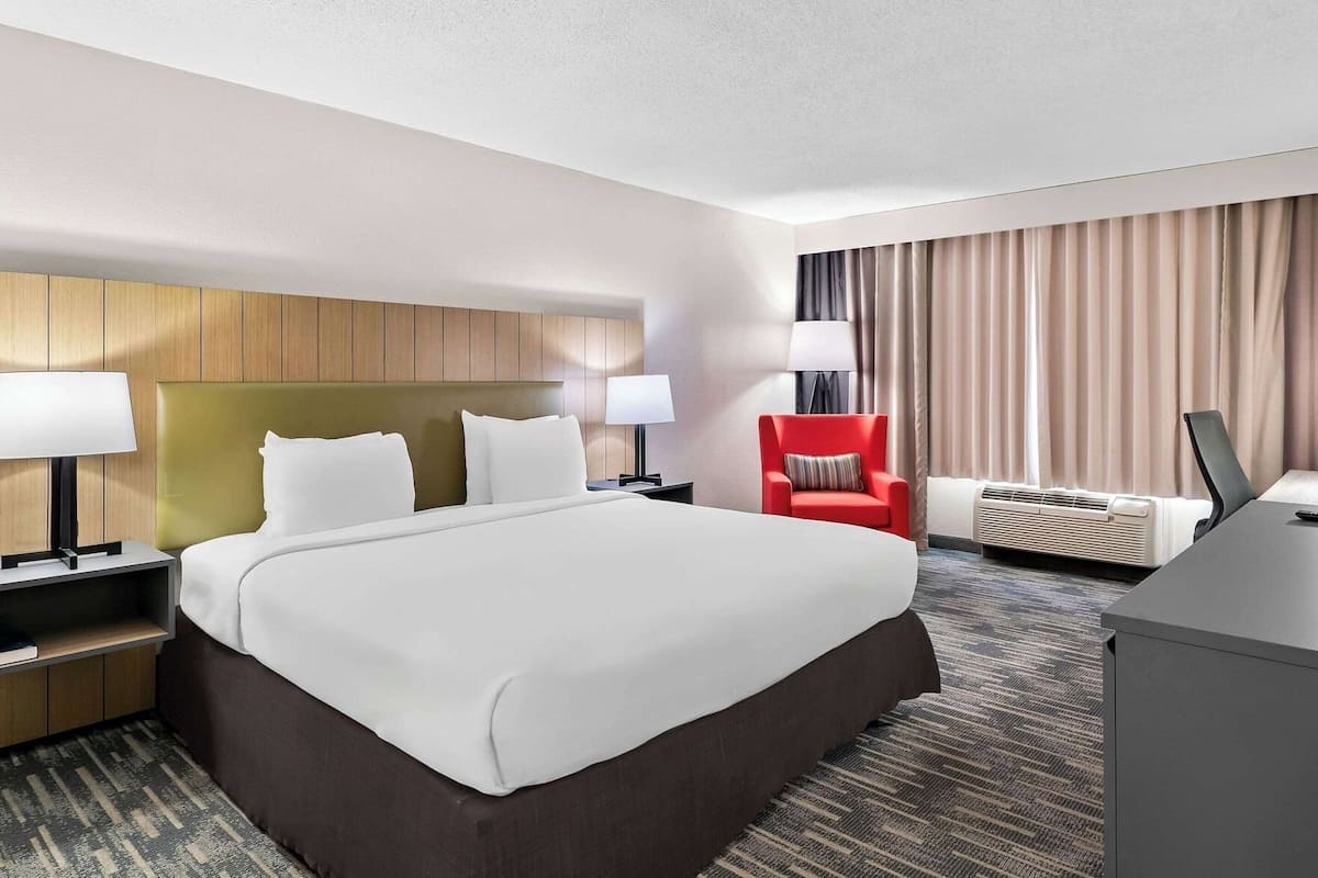Premium bedding, down comforters, desk, laptop workspace