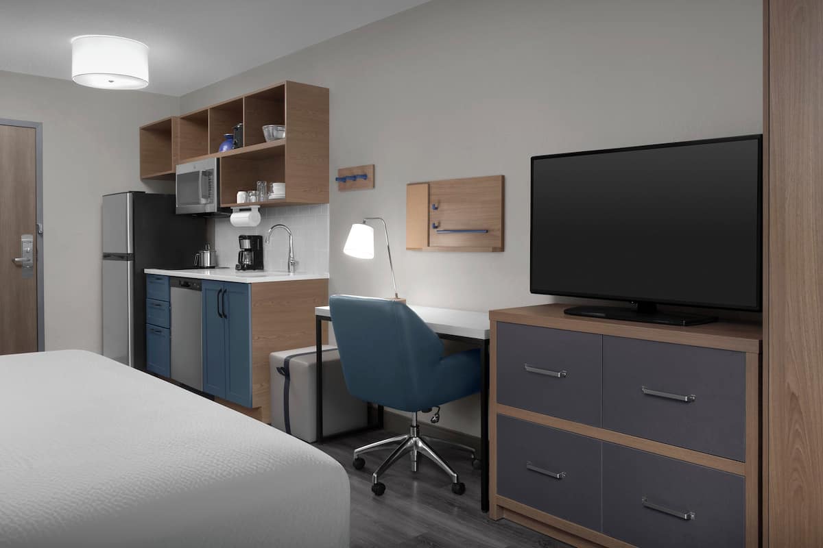 Desk, laptop workspace, blackout curtains, iron/ironing board