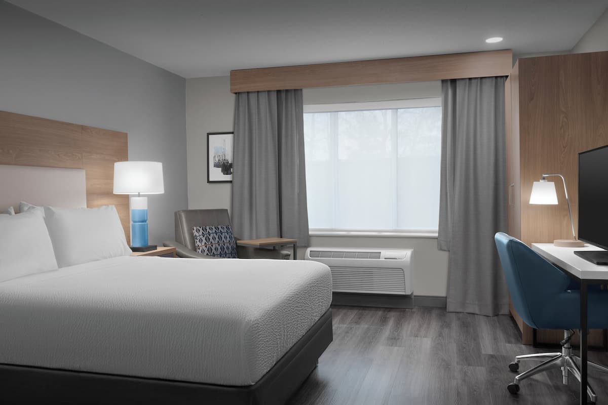 Desk, laptop workspace, blackout curtains, iron/ironing board
