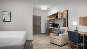 Studio Suite, 1 Queen Bed, Mobility Accessible (Accessible Shower) | Desk, laptop workspace, blackout drapes, iron/ironing board