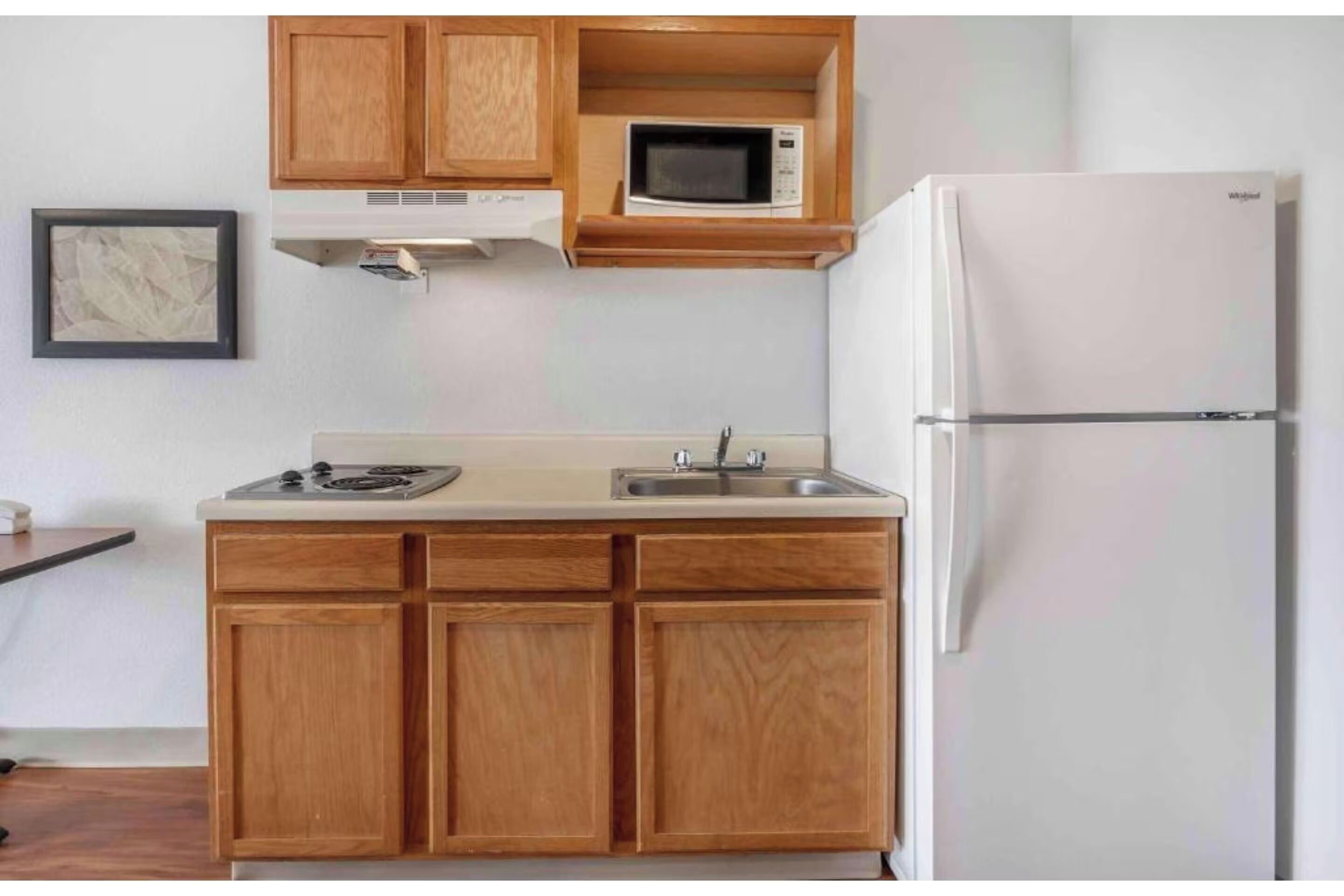 Full-sized fridge, microwave, stovetop, freezer
