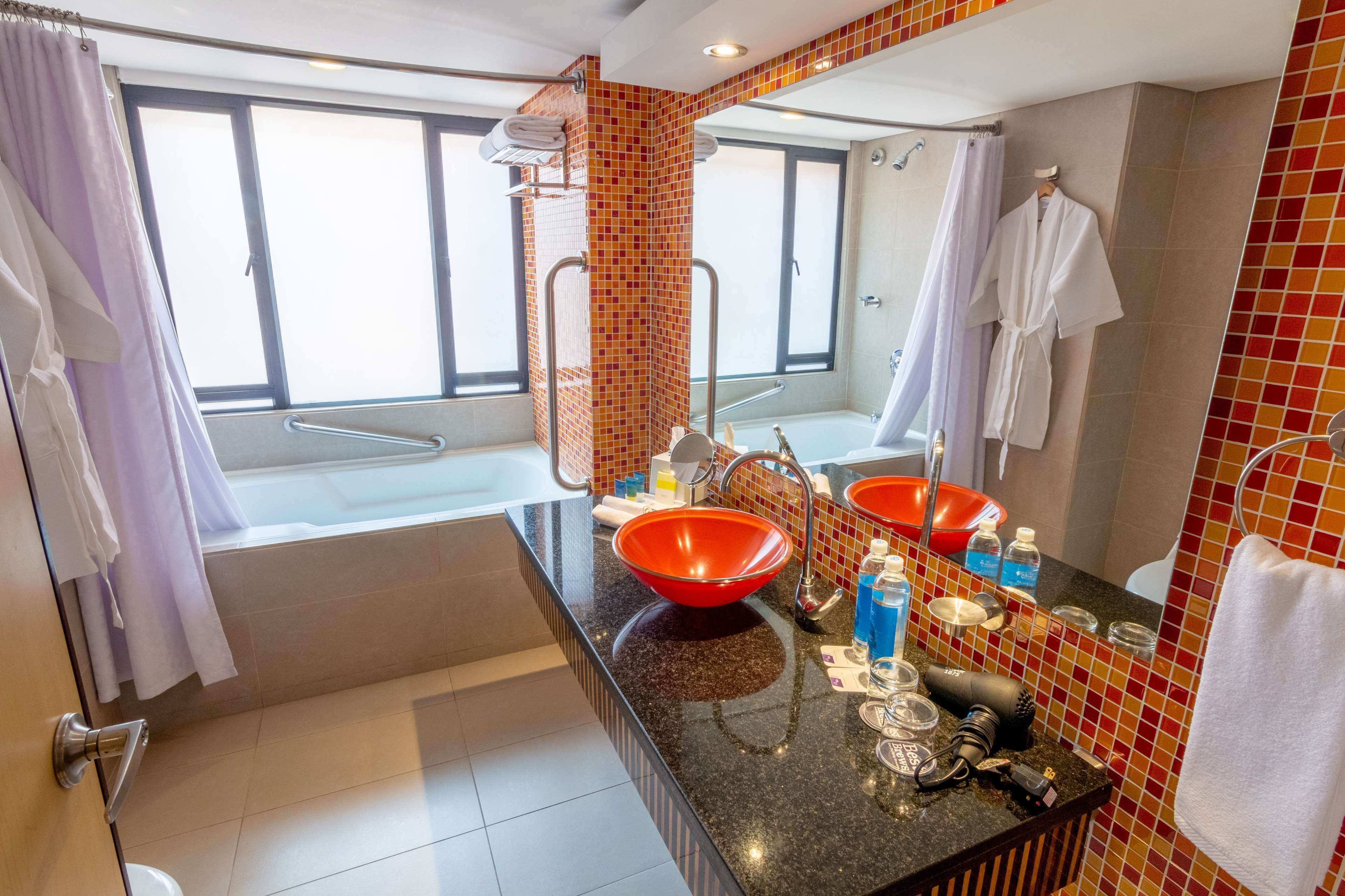 combined shower/bathtub, free toiletries, hair dryer, towels