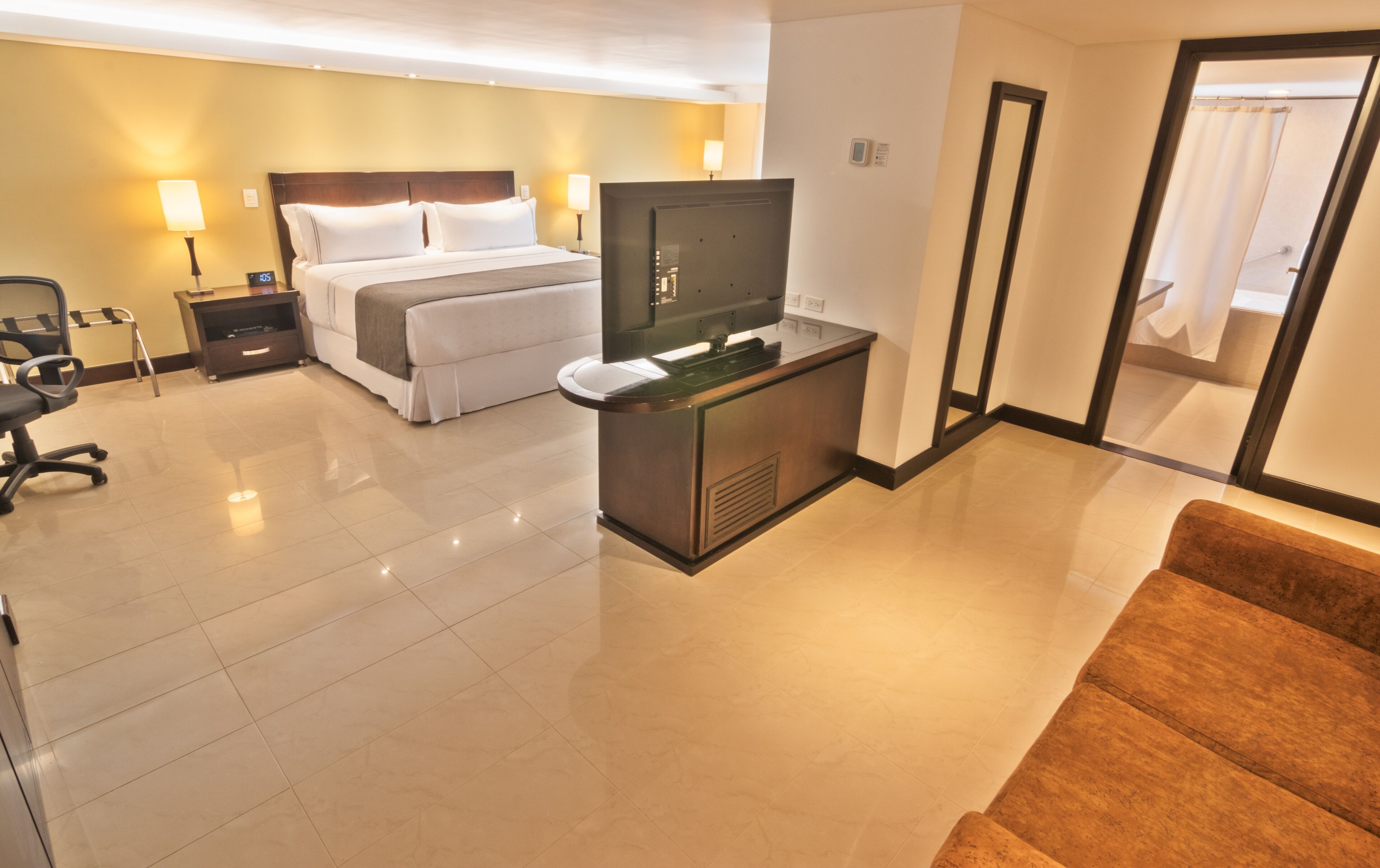 suite, 1 king bed (suite junior) | in-room safe, desk, blackout curtains, iron/ironing board