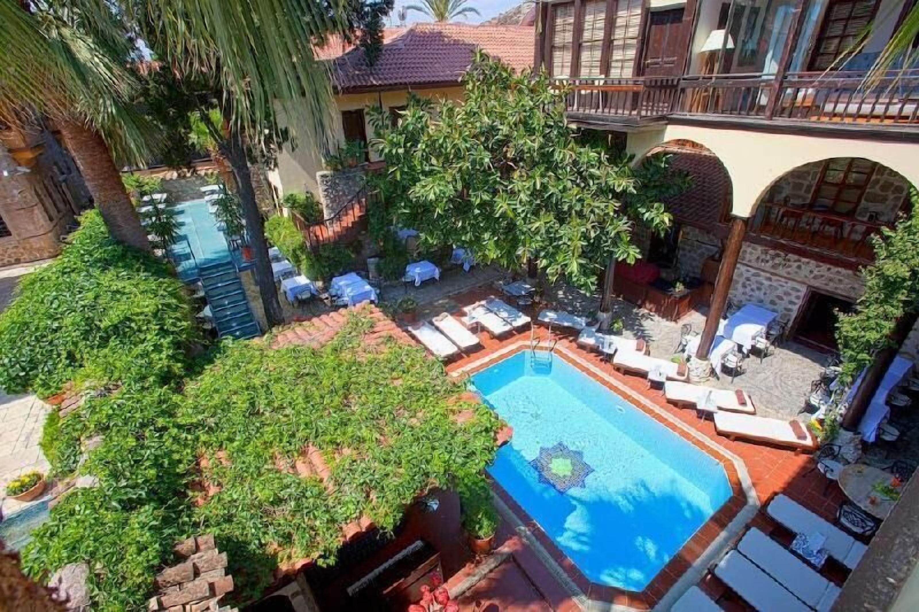 Pool | Outdoor pool, open 9 AM to 6 PM, pool umbrellas, sun loungers