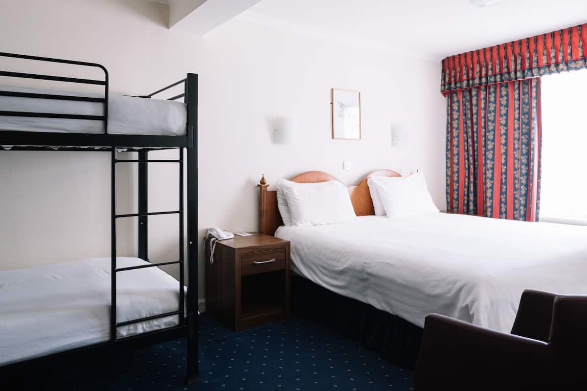 Family Room | In-room safe, desk, blackout drapes, iron/ironing board (on request)
