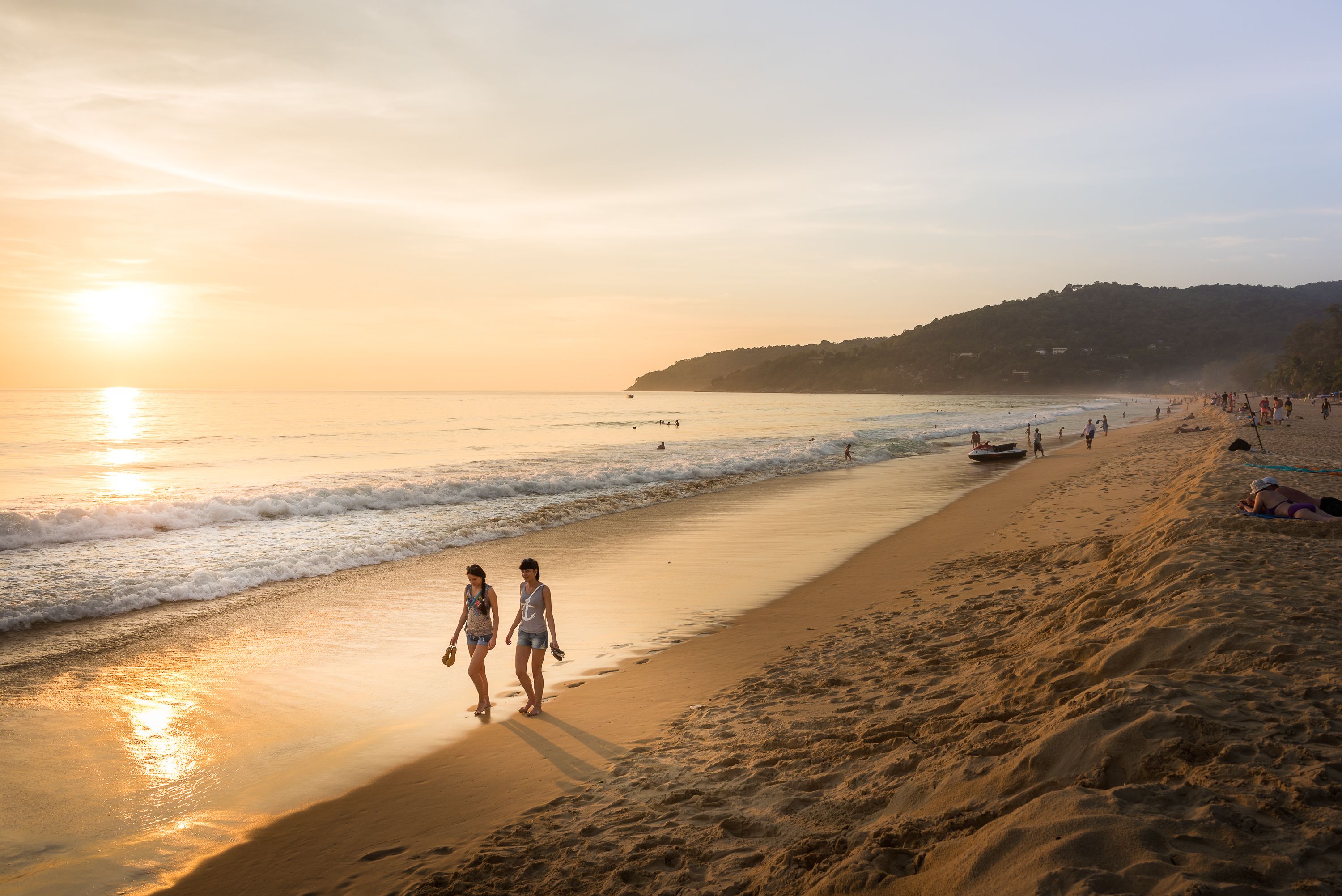 beach nearby, white sand, beach towels, beach volleyball