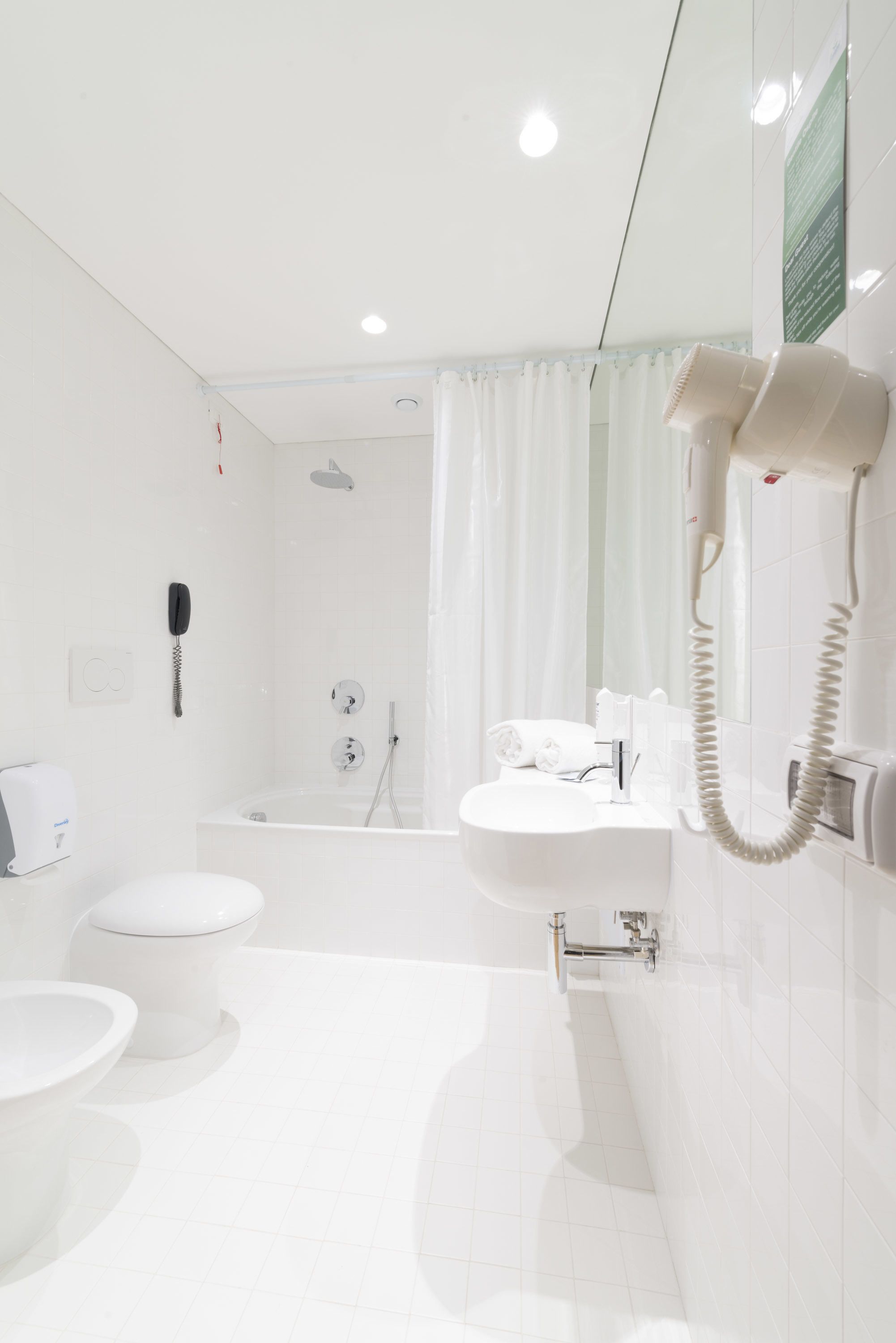 superior double room | bathroom | hair dryer, bidet, towels