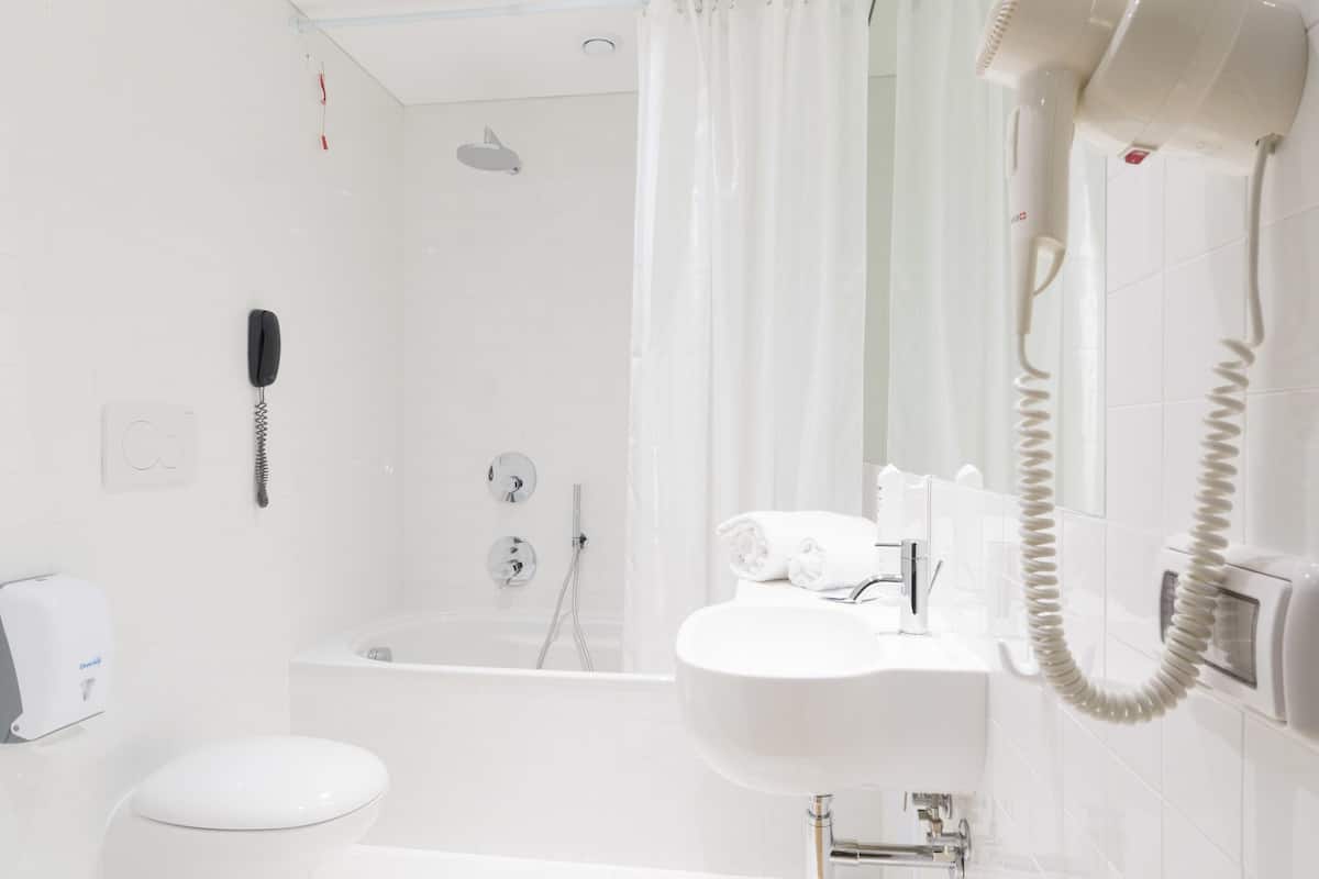 superior double room | bathroom | hair dryer, bidet, towels