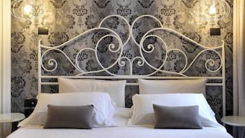 Frette Italian sheets, premium bedding, Select Comfort beds, minibar
