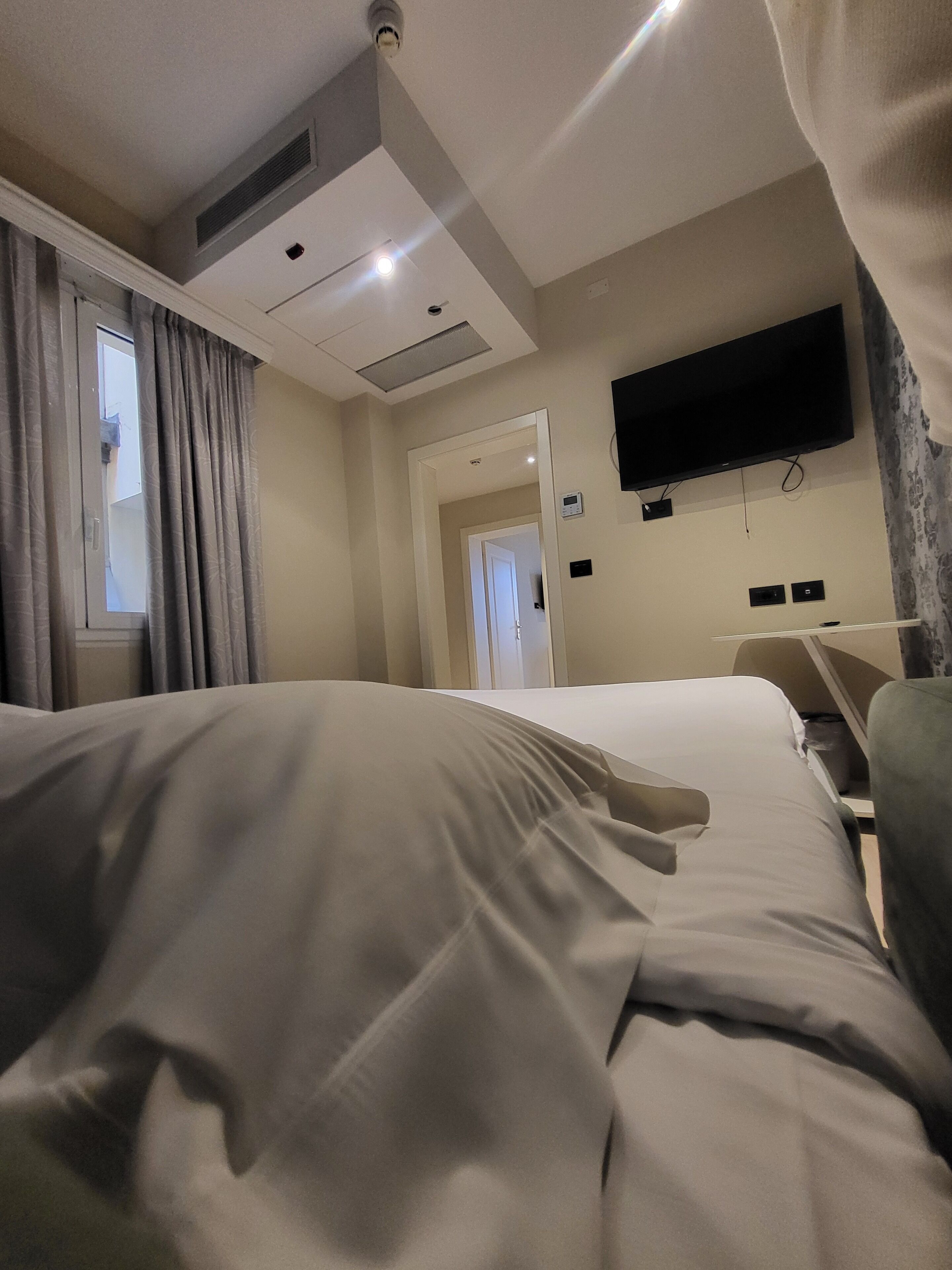 quadruple room | frette italian sheets, premium bedding, select comfort beds, minibar