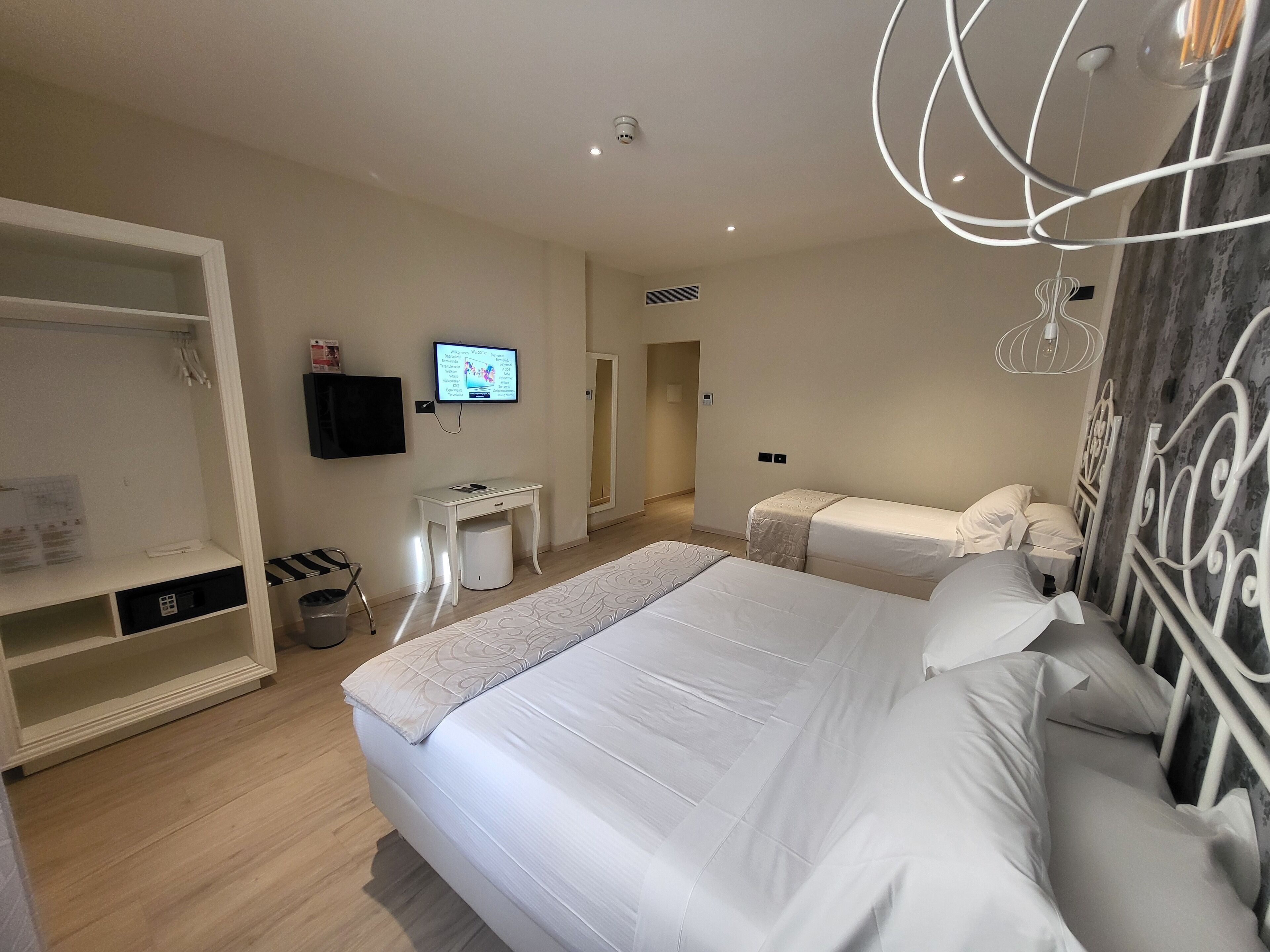 classic triple room | frette italian sheets, premium bedding, select comfort beds, minibar