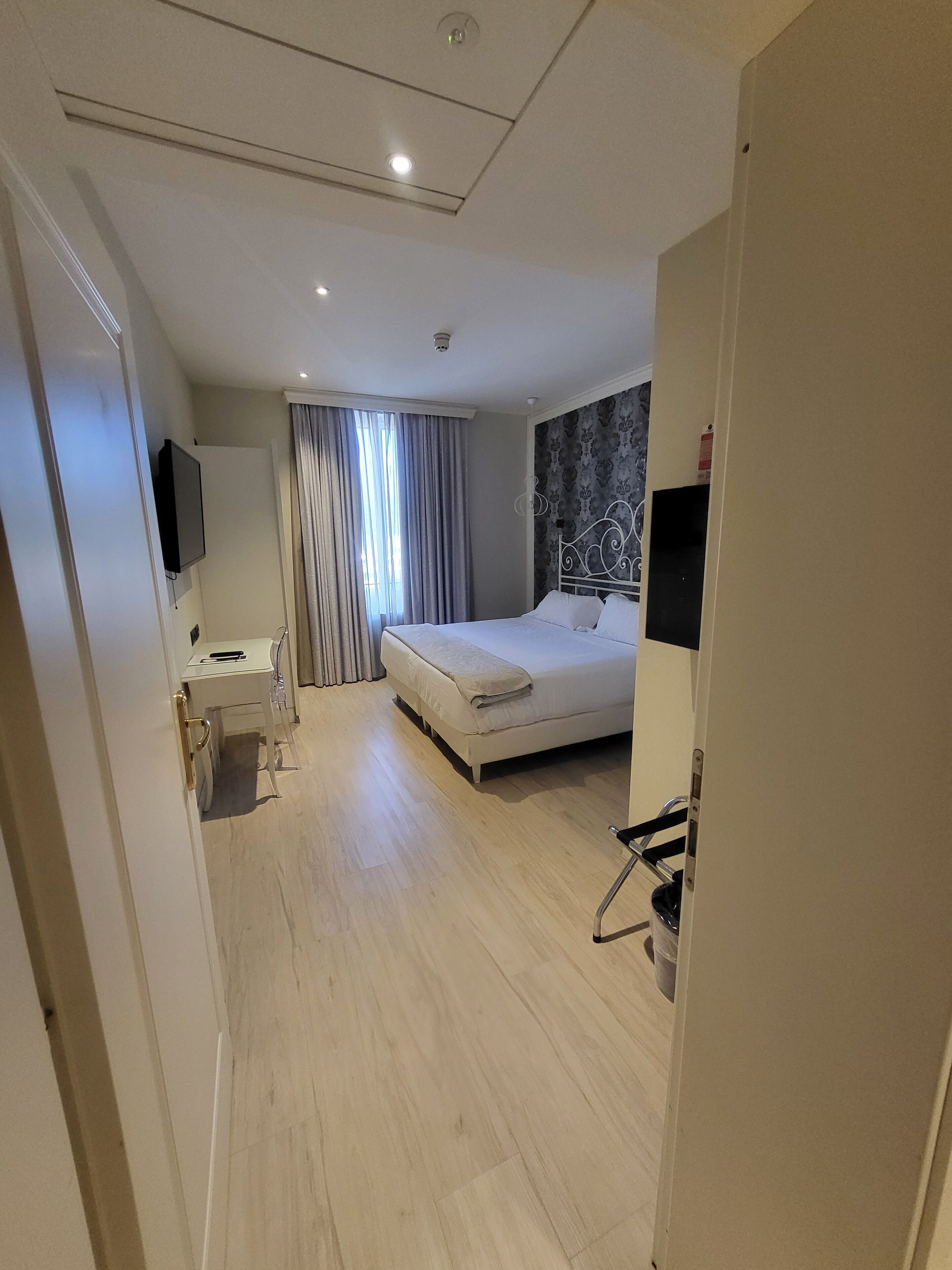 quadruple room | frette italian sheets, premium bedding, select comfort beds, minibar