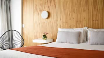 Premium bedding, down comforters, pillowtop beds, in-room safe