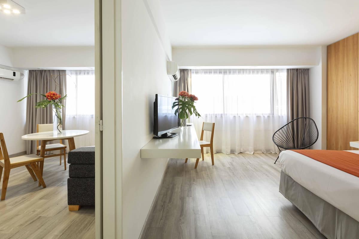 Premium bedding, down duvets, pillow-top beds, in-room safe