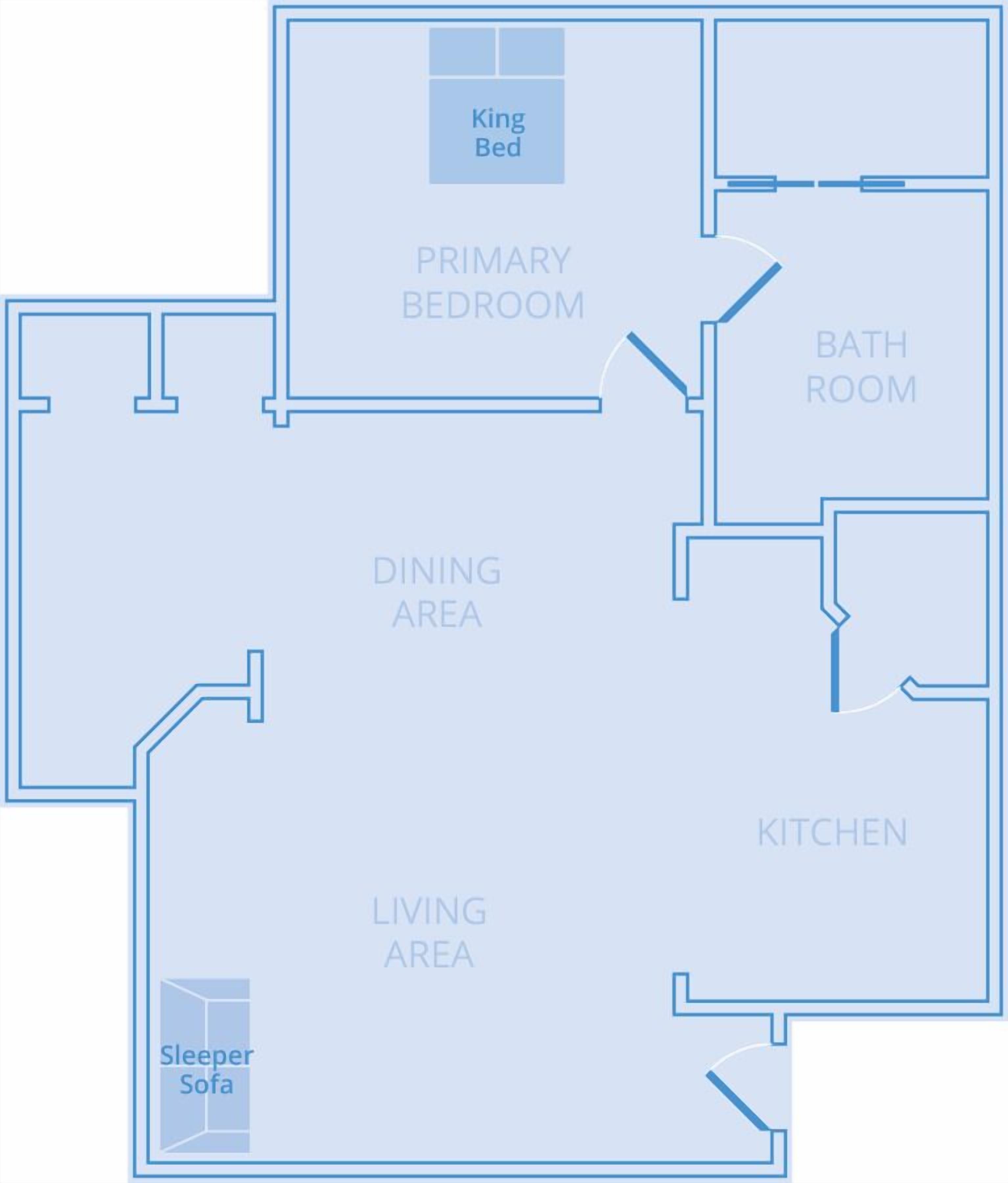Un plan d’étage comprenant une chambre principale avec un grand lit, une salle de bain, une cuisine, un coin repas, un salon et un canapé-lit.