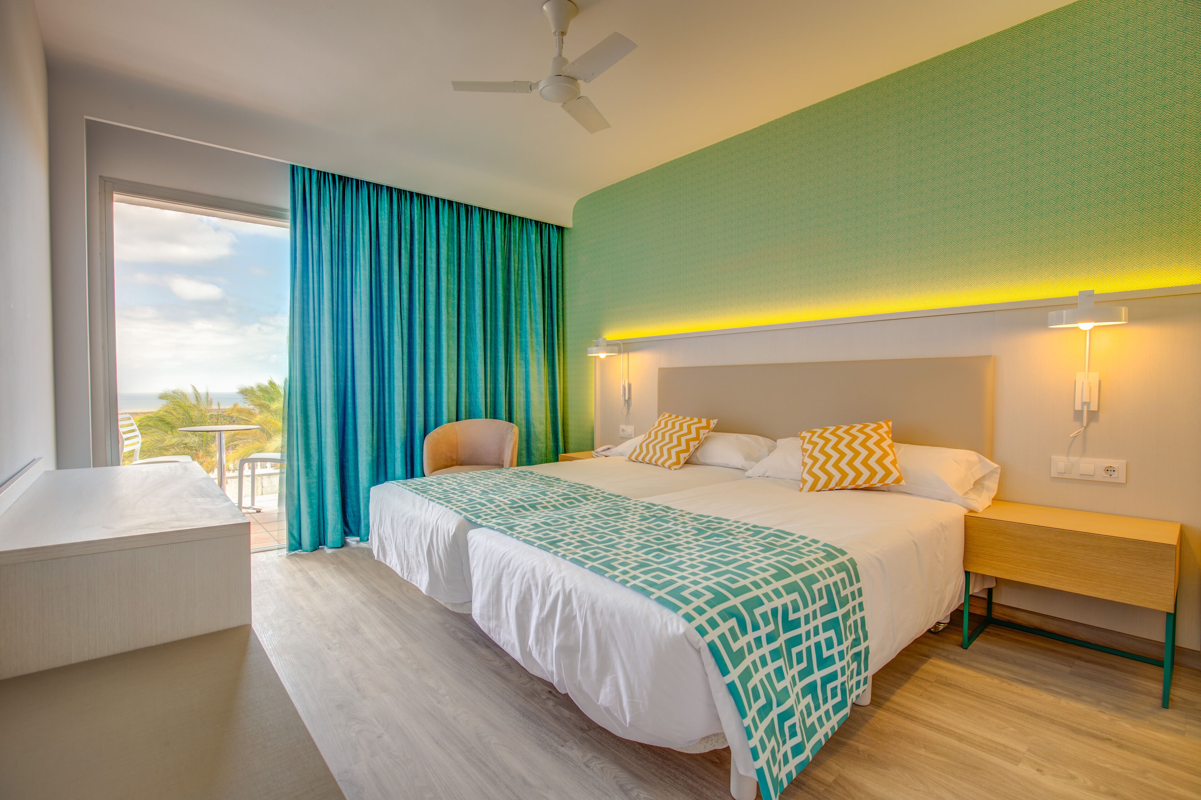 Minibar, desk, blackout curtains, bed sheets