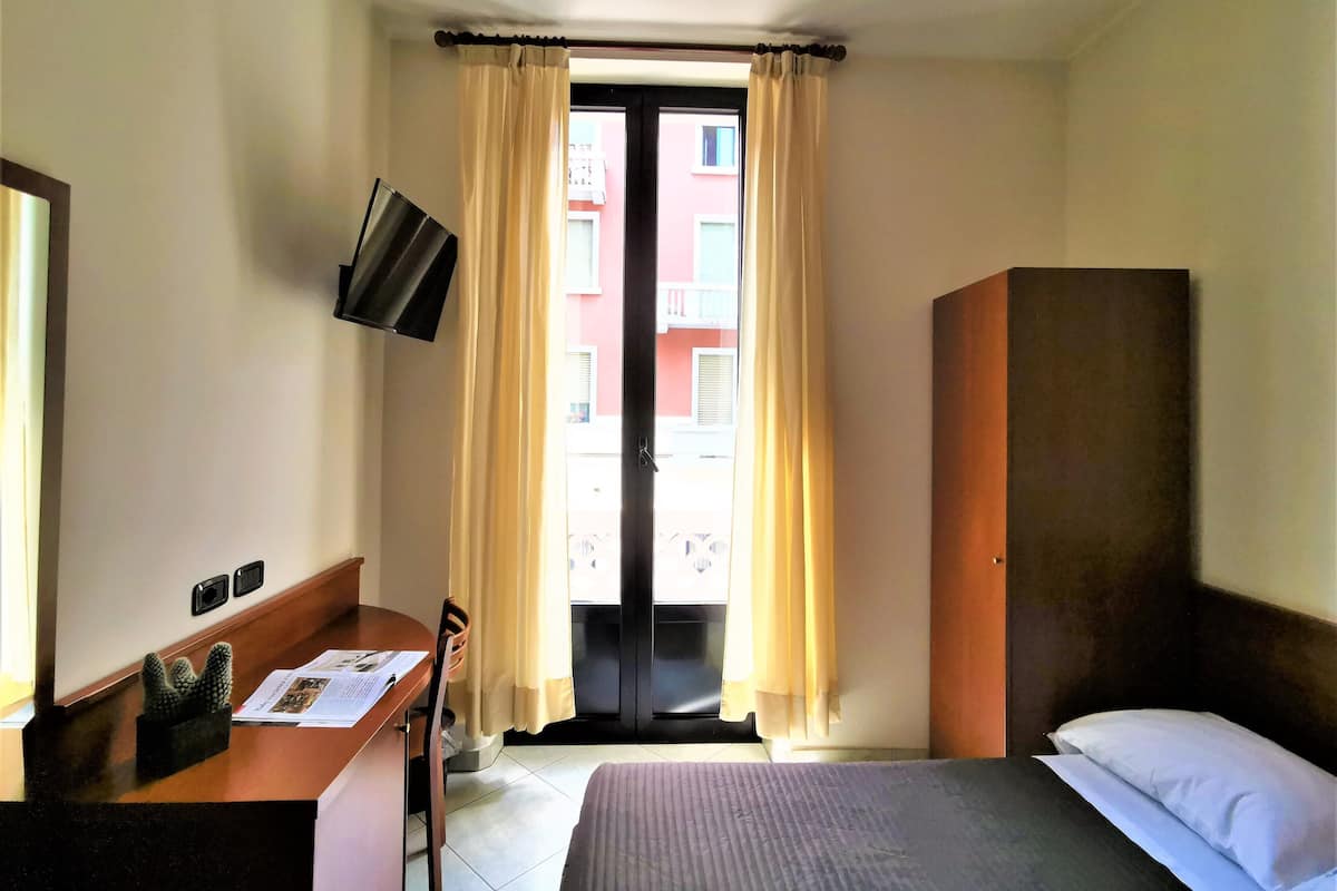 Single Room | Down comforters, minibar, in-room safe, desk