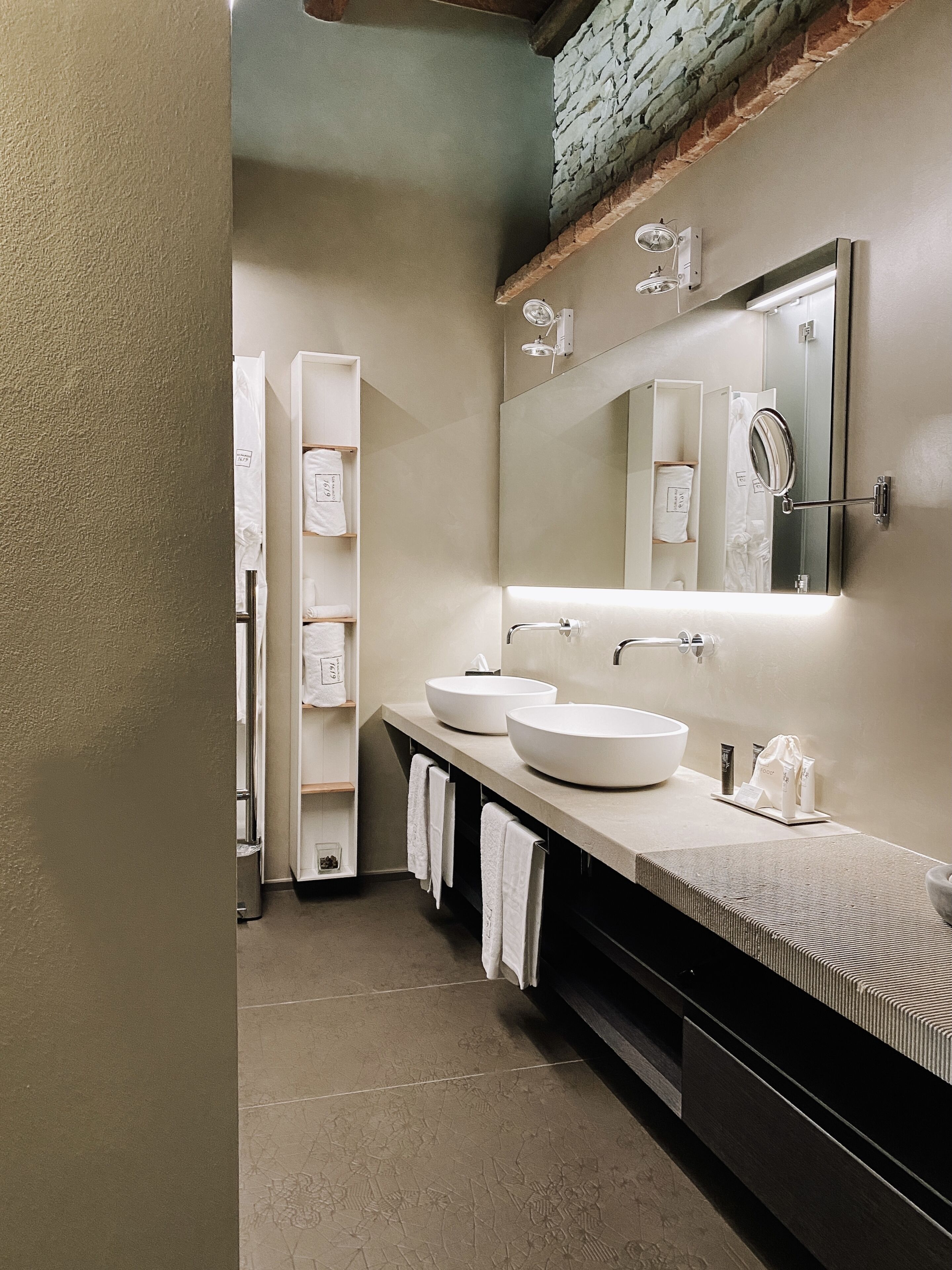 designer toiletries, hair dryer, bathrobes, slippers