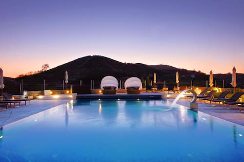 Indoor pool, seasonal outdoor pool, pool umbrellas, sun loungers