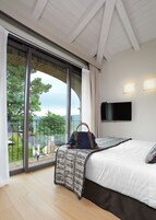 Suíte panorâmica | Roupas de cama premium, edredons de pluma, frigobar, cofres nos quartos