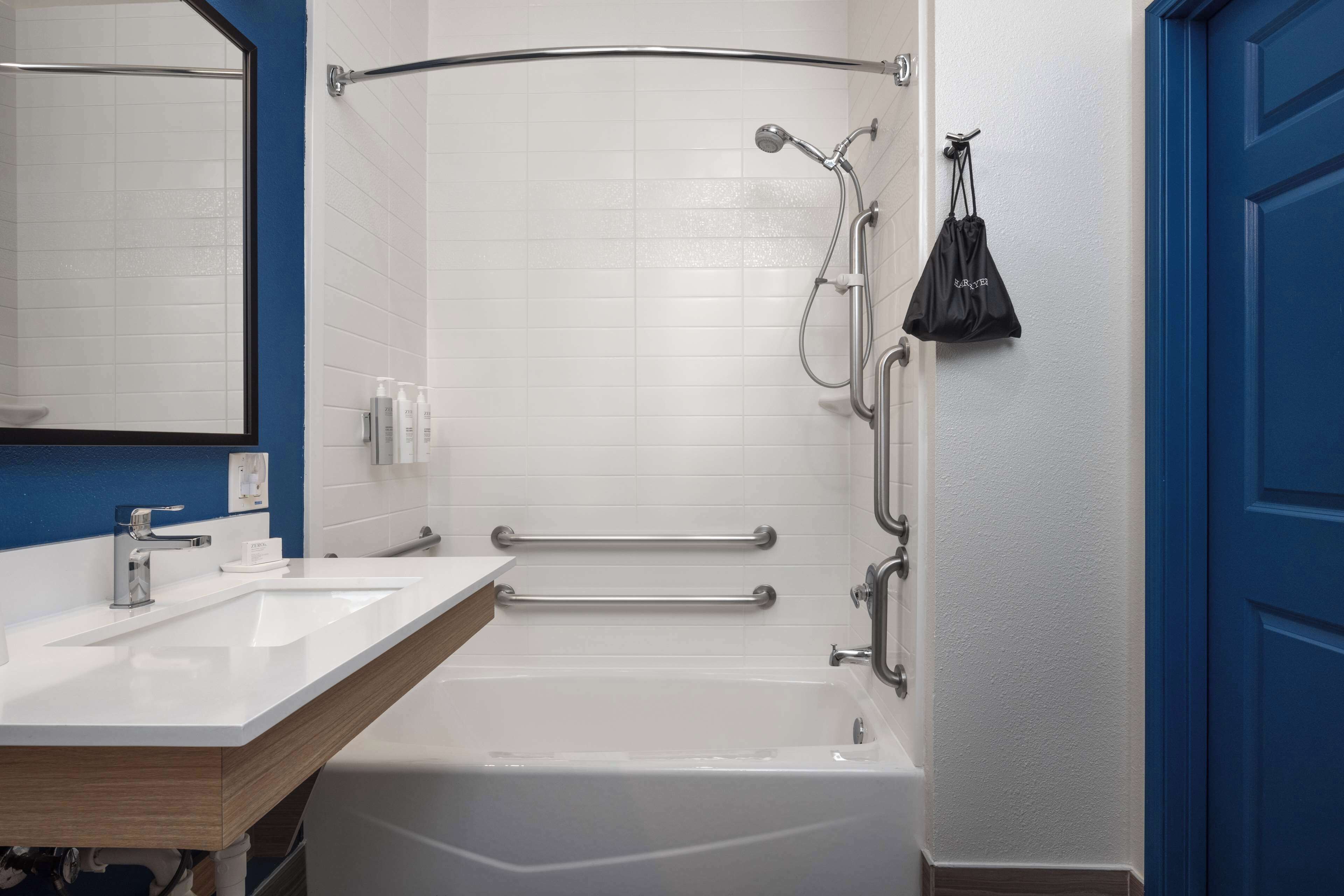 combined shower/bathtub, free toiletries, hair dryer, towels