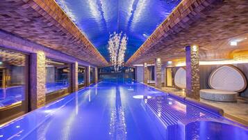 Indoor pool, outdoor pool, pool umbrellas, pool loungers