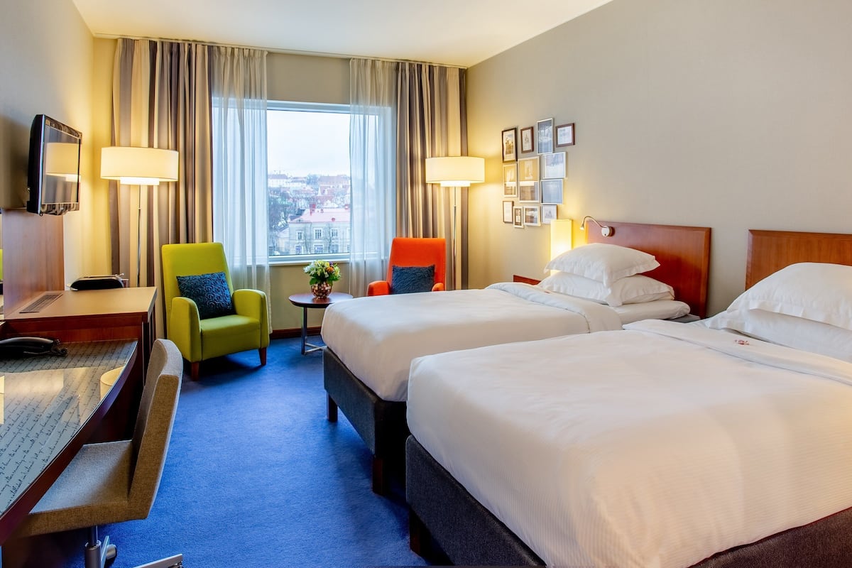 Hypo-allergenic bedding, minibar, desk, iron/ironing board