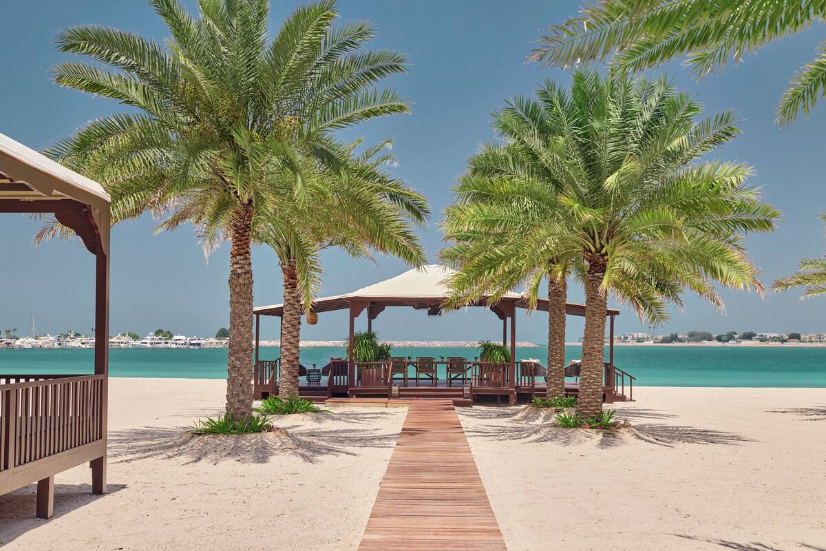 private beach, beach umbrellas, beach towels, scuba diving