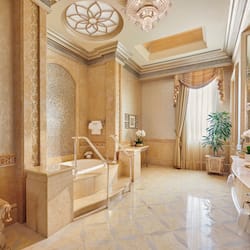 Separate tub and shower, designer toiletries, hair dryer, bathrobes