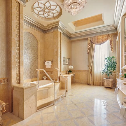 Separate tub and shower, designer toiletries, hair dryer, bathrobes