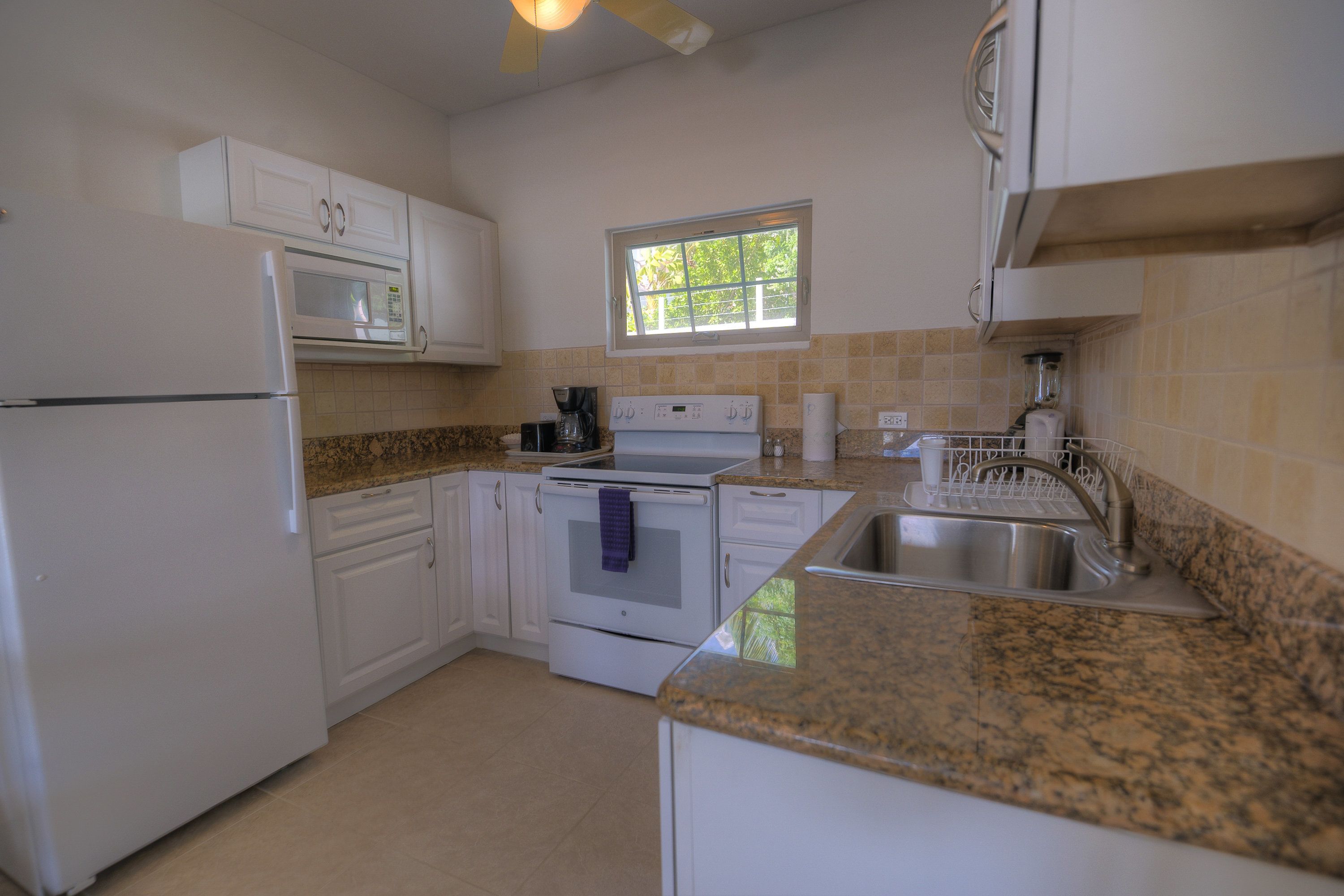 2 bedroom poolside | private kitchen | fridge, microwave, oven, stovetop