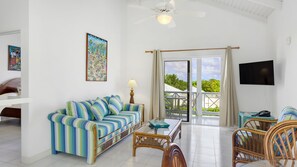 Room, 1 Bedroom, Poolside | Living area | Flat-screen TV, DVD player