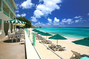 Outdoor pool, pool loungers - Coral Mist Beach Hotel (Worthing)