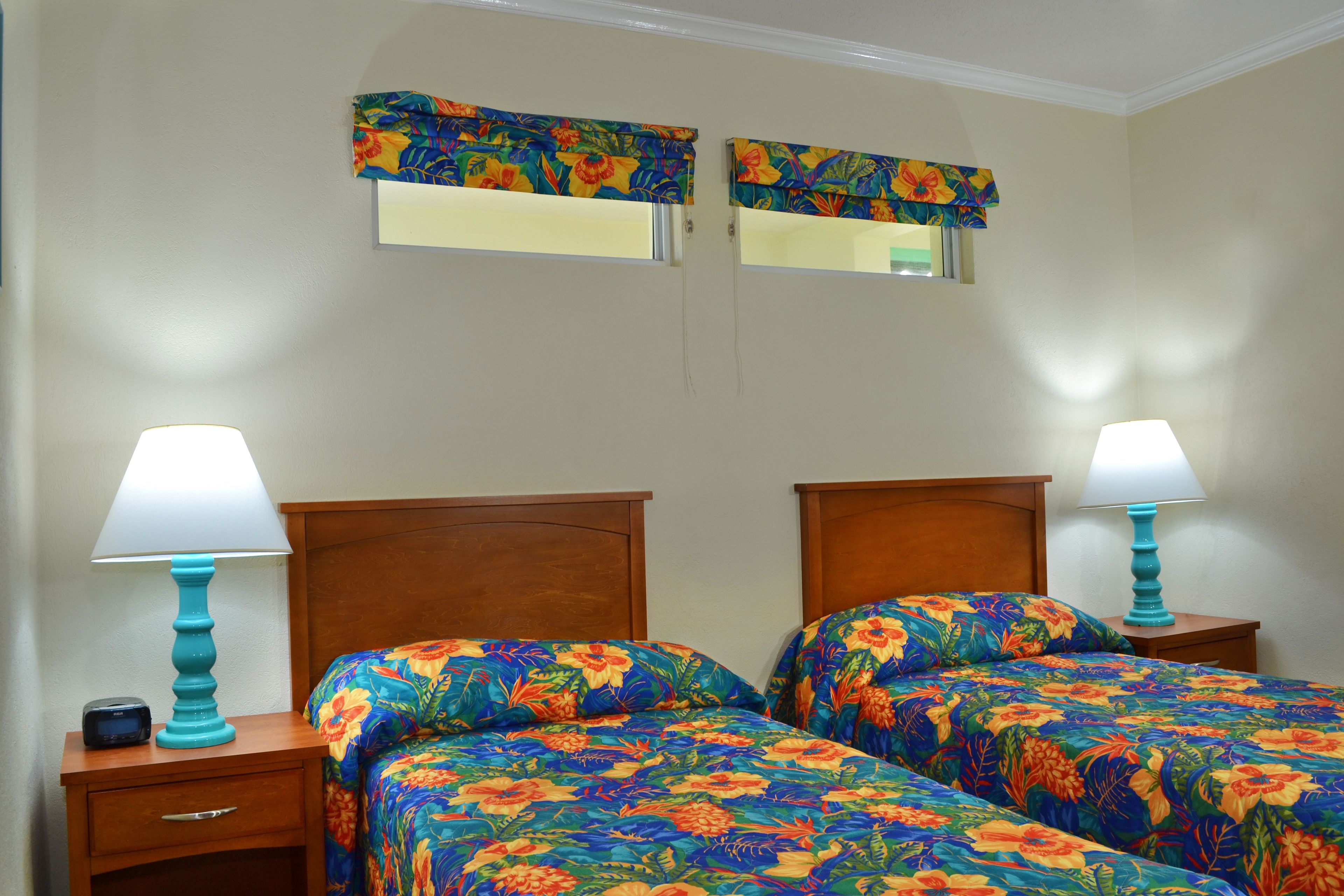 deluxe apartment, 2 bedrooms, 2 bathrooms, beachfront | in-room safe, desk, laptop workspace, iron/ironing board
