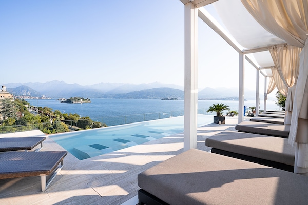 Seasonal outdoor pool, pool umbrellas, pool loungers
