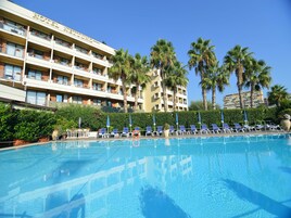 Outdoor pool, pool umbrellas, pool loungers