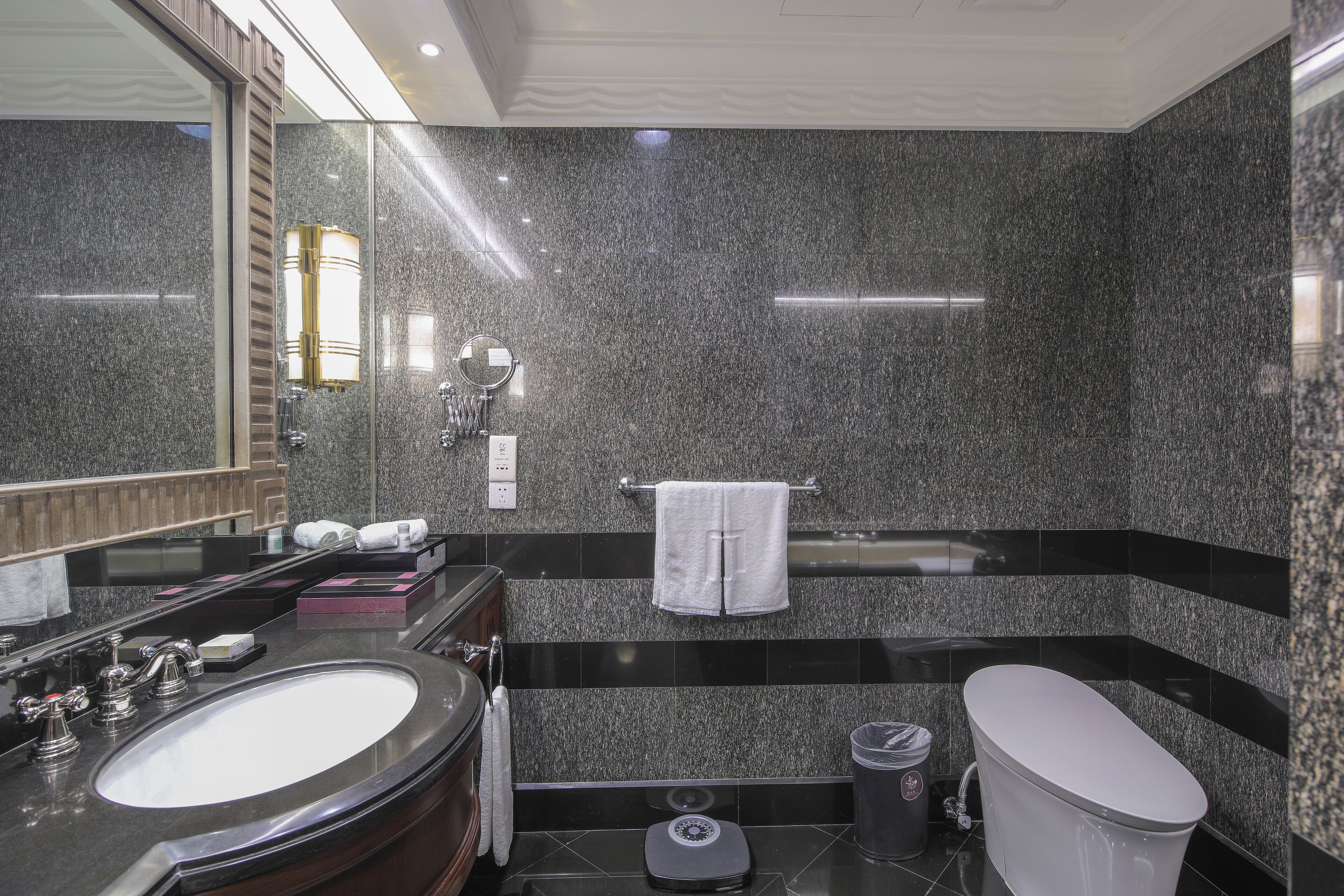 jin jiang suite in grosvenor house | bathroom | separate bathtub and shower, rainfall showerhead, free toiletries