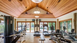 A gym with treadmills, elliptical machines, and weight equipment. - Villages at Mauna Lani (Kamuela)