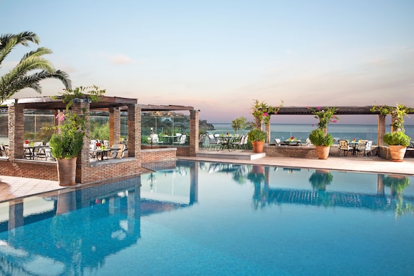 Indoor pool, pool umbrellas, sun loungers